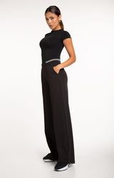 Aura Short Sleeve crop tee in Black - women's fitted top with wide leg pants, side full length view